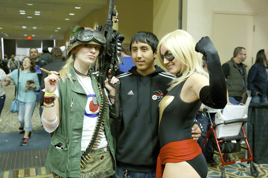 Tank Girl and Ms. Marvel Flank Con Goer
